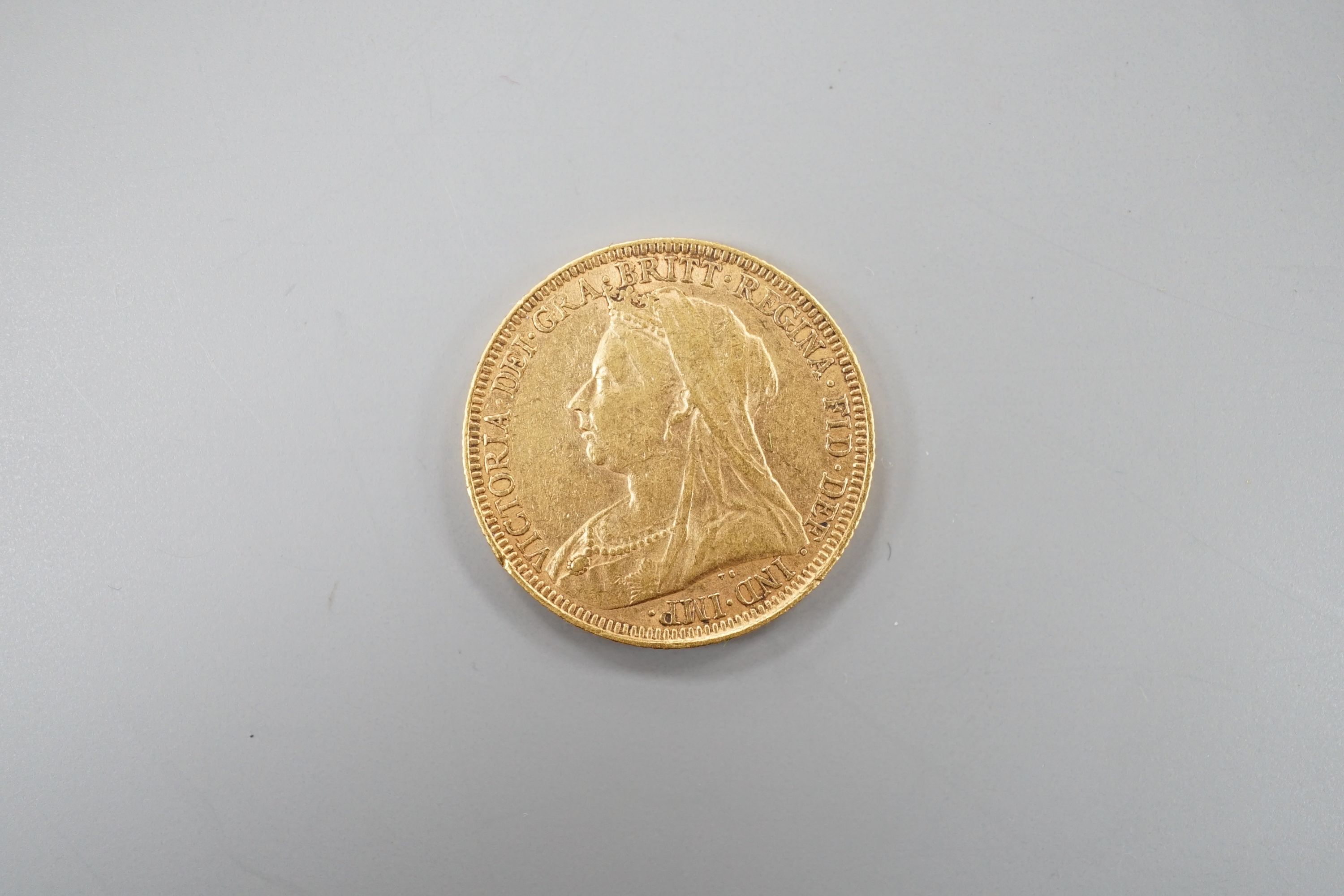 A Victoria 1893 gold sovereign.